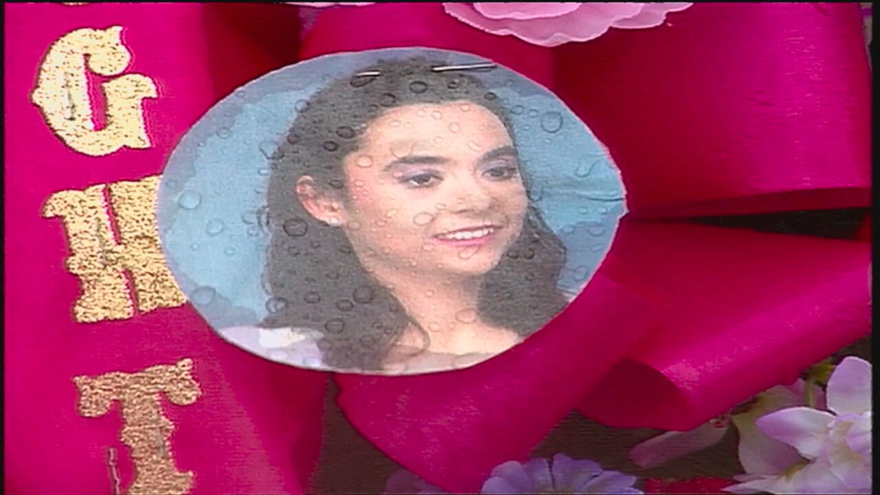 Cory Rubio photo on grave flower marker